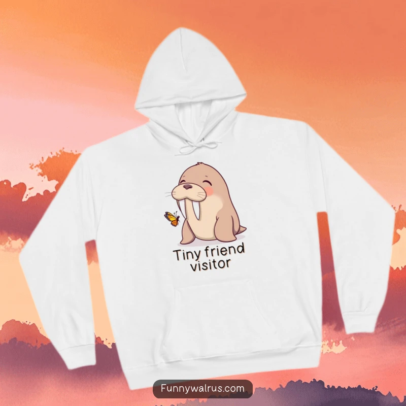 Funny walrus giggling as a butterfly lands on its tusk, on a cozy hoodie, blending warmth with gentle humor.